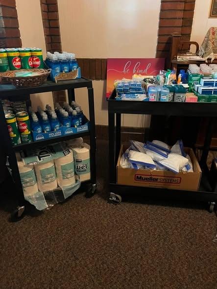 Free Community Essential Pantry sign — Wednesdays 2:00–3:00 PM, take what you need, give what you can