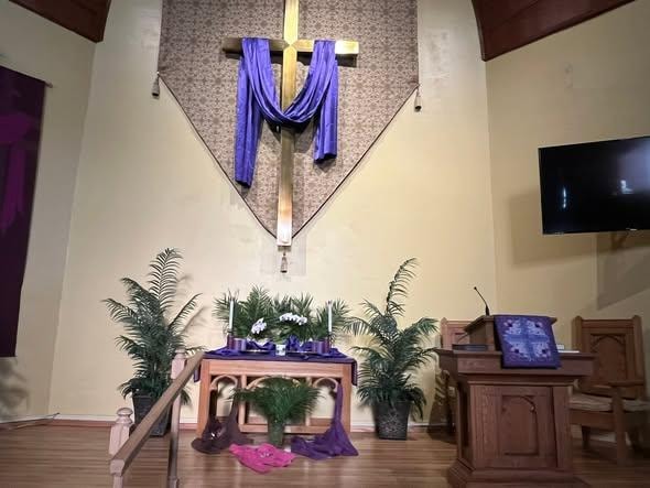 Cross and altar in the sanctuary